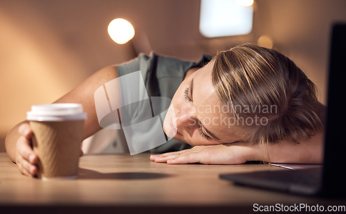 Image of Burnout, sleeping and tired young business woman working at night in office on laptop for deadline, email or proposal. Sleep, exhausted and corporate employee suffering fatigue, workload and pressure