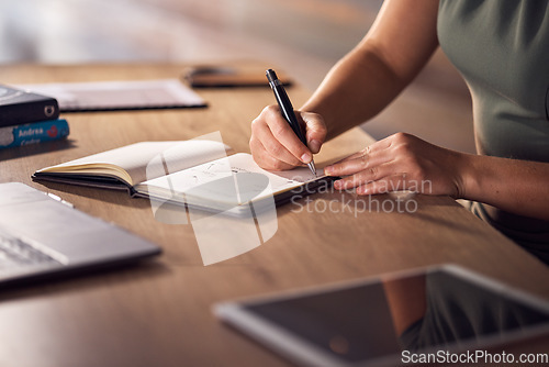 Image of Business woman, hands or notebook writing in night office for company planning, schedule or ideas management. Zoom, corporate or worker with book, pen or tablet technology for evening project agenda