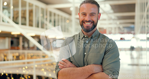 Image of Business man, happy and arms crossed portrait while in office as leader with motivation. Smile of entrepreneur person at creative workplace for management vision, development and company growth