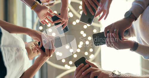 Image of Low, connection and business people with phone for bluetooth, social media and communication. Planning, email and group of employees typing on a mobile for an app, chat and sync while networking