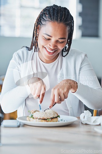 Image of Black woman eating sandwich at restaurant for customer services or experience of breakfast or lunch. Black person or consumer and bagel, burger or food at small business cafe or cafeteria for review