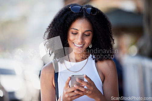 Image of Black woman, afro and phone on city social media, sales promo or clothes discount deals on internet website. Smile, happy and relax urban fashion on mobile technology, retail customer or consumer app