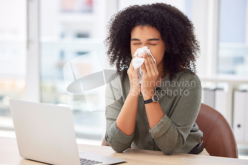 Image of Sick, laptop and blowing nose with black woman in office for virus, illness and allergy symptoms. Disease, tissue and sneeze with employee suffering at desk with condition, flu and cold infection