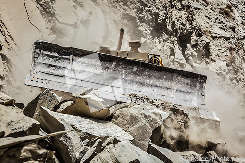 Image of Bulldozer doing road construction in Himalayas