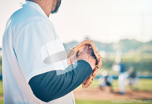 Image of Baseball, pitcher and fitness with man on field for throwing, training and practice in competition match. Workout, focus and skills with athlete playing in park stadium for exercise, league and game