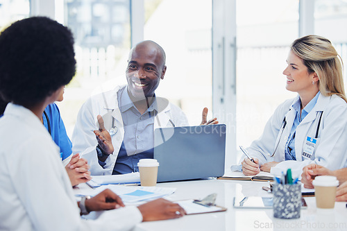 Image of Medical, meeting and doctors with laptop for research, planning and surgical innovation at hospital. Doctor, team and health experts brainstorm, problem solving and discussing online project together