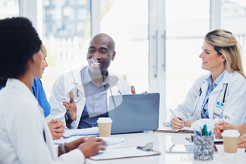 Image of Meeting, medical and doctors with laptop for research, planning and surgical innovation at hospital. Doctor, team and health experts brainstorm, problem solving and discussing online project together