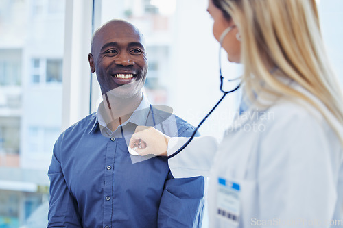 Image of Patient, doctor woman and consultation with stethoscope in hospital for cardiology or health insurance. Black man and healthcare person talking about lungs, breathing and advice for healthy heart