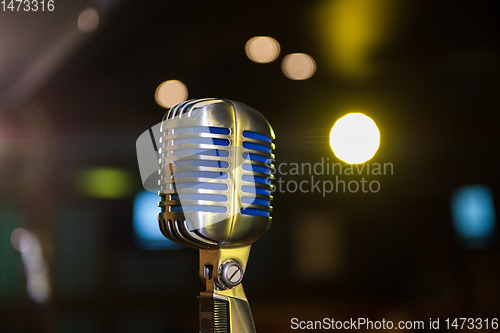 Image of retro microphone at concert