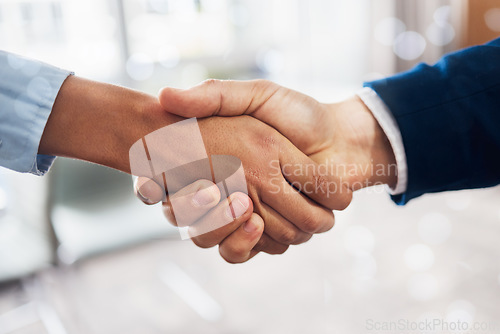 Image of B2b, black woman or businessman handshake in deal, meeting or startup project partnership together. Teamwork, crm or people shaking hands for sales goals, bonus target or hiring agreement in office