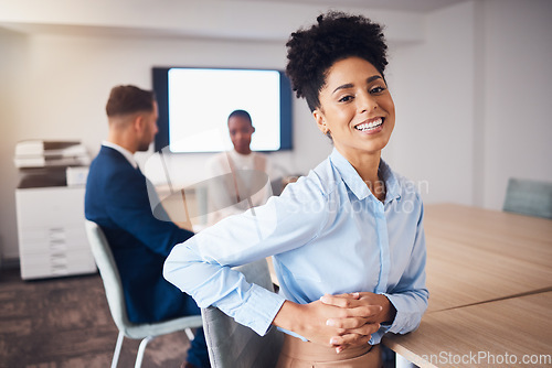 Image of Corporate, happy and portrait of a woman in a meeting, workshop or seminar with colleagues. Business, cheerful and employee laughing in a boardroom for training, a conference and group coworking