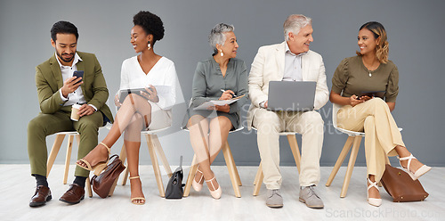 Image of HR, technology and business people waiting in line for a recruitment interview. Hiring, resume or cv with a man and woman employee sitting in a human resources candidate line for opportunity