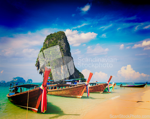 Image of Long tail boat on beach, Thailand