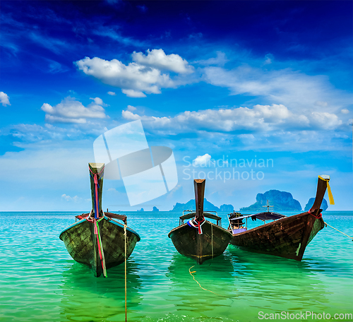 Image of Long tail boats on beach, Thailand