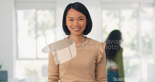 Image of Asian woman, portrait and business person with a happy smile at busy office as corporate leader. Female entrepreneur as startup company manager during Christmas holiday for growth and development