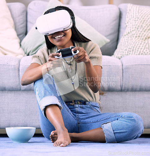 Image of Black woman, video games and virtual reality gaming on home floor for metaverse, ar and ux. Gamer person with console and vr headset for cyber or 3d digital world streaming with futuristic tech