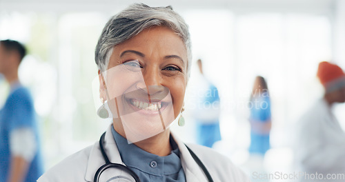 Image of Face, doctor and woman laughing in hospital ready for tasks, goals or targets. Leadership, senior or portrait of comic healthcare worker or female medical physician happy with career or job at clinic