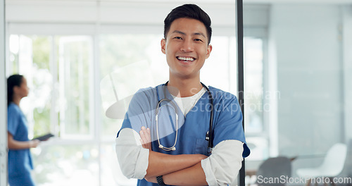 Image of Asian man, face and doctor smile for healthcare, vision or career ambition and advice at the hospital. Portrait of happy and confident Japanese medical expert smiling, phd or medicare at the clinic