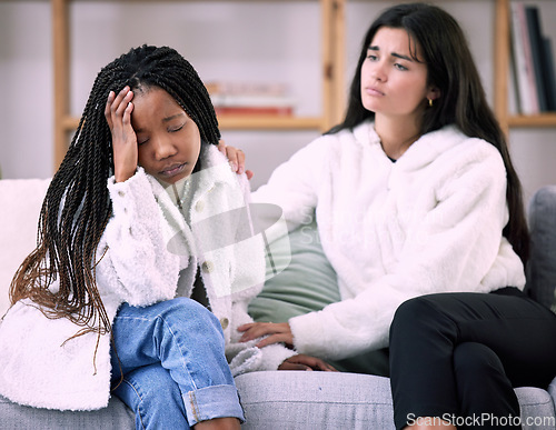 Image of Sad, friends and empathy with women on sofa in living room for comfort, grief and depression. Mental health, emotional support and care with girl consoling at home for solidarity, advice and worry