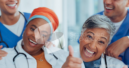 Image of Doctor, team and face with smile for teamwork, collaboration or fun laughing in about us at hospital. Group of healthcare experts laugh and smiling in happiness for medical success or team building