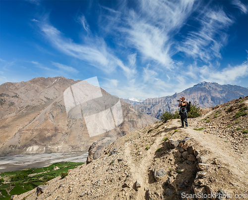 Image of Photographer taking photos in Himalayas