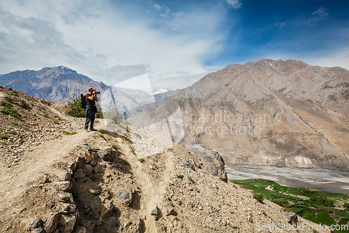 Image of Photographer taking photos in Himalayas