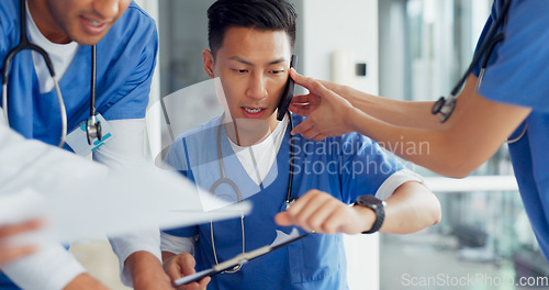 Image of Busy, phone call and doctor with medical paperwork, hospital chaos and anxiety from healthcare work. Clinic schedule, communication and Asian nurse with help from employees during overwhelming agenda