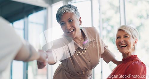 Image of Meeting, handshake and collaboration with a business woman in partnership with her team in the boardroom. Welcome, teamwork and diversity with a female leader and employee group working in the office