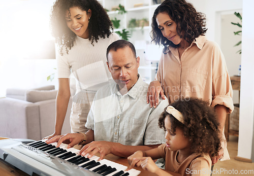 Image of Family, keyboard piano and playing music with grandparents, mother and child with people bonding. Happiness, relationship and generations, teaching and learning, creativity and musical instrument