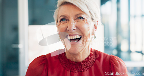 Image of Face, laugh or humor and a senior business woman at work in her office with a carefree or positive attitude. Comic, laughter and joke with a mature female employee or manager working for success