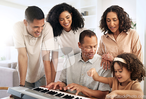 Image of Family, keyboard piano and play music with grandparents, parents and child with people bond at home. Happiness, relationship and generations, teaching and learning, creativity and musical instrument