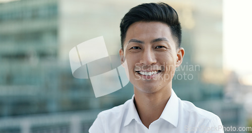 Image of Happy, smile and face of businessman in city for management, leadership or vision. Professional, executive and future with portrait of Asian employee on rooftop of startup for mindset, career or goal