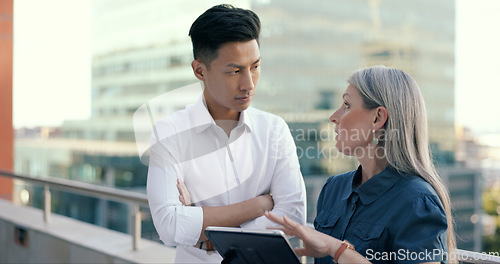 Image of Business people diversity, tablet or office balcony in digital marketing research, strategy planning or calendar management. Mature ceo, talking manager or internship training schedule on technology