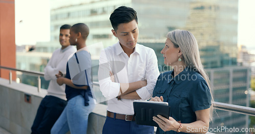 Image of Business people diversity, tablet or office balcony in digital marketing research, strategy planning or calendar management. Mature ceo, talking manager or internship training schedule on technology