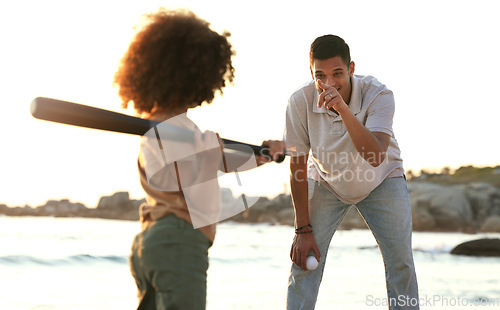 Image of Baseball, father and girl play at beach, having fun and enjoying holiday together. Care, exercise and happy man pointing at kid or foster child while playing sports and bonding by seashore at sunset.