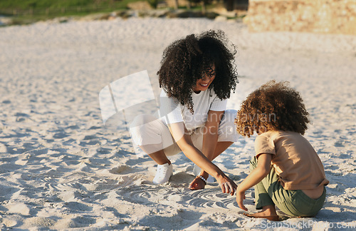 Image of Black family at the beach, mother and child play in sand on summer holiday, freedom and travel with nature outdoor. Fun together, vacation and carefree with happiness, woman and girl in Jamaica