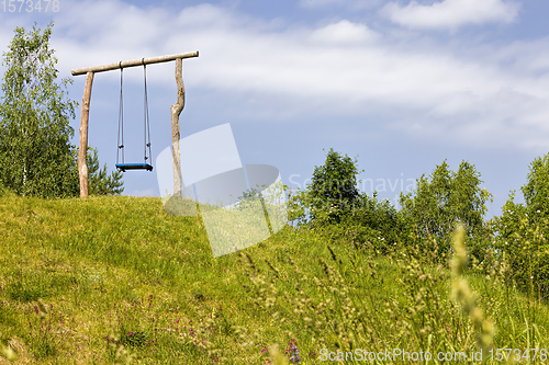 Image of ordinary wooden swing