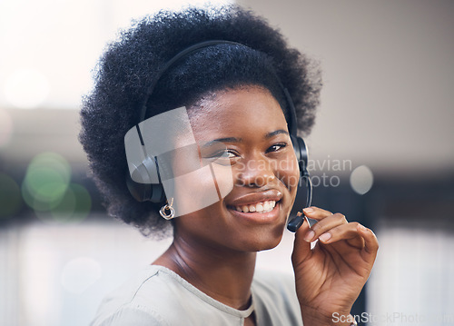 Image of Portrait, call center and support with a black woman consultant working in her telesales office. Contact us, customer service and telemarketing with a female employee consulting using a headset