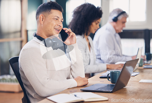 Image of Business man, phone call and communication with networking, b2b and deal negotiation with laptop for research. Connectivity, male employee with smile and telecom in coworking workspace with contact