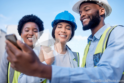 Image of Black man, architect and phone with team in construction for project planning, teamwork or leadership on site. Happy group of engineers smiling for industrial architecture or contract with smartphone