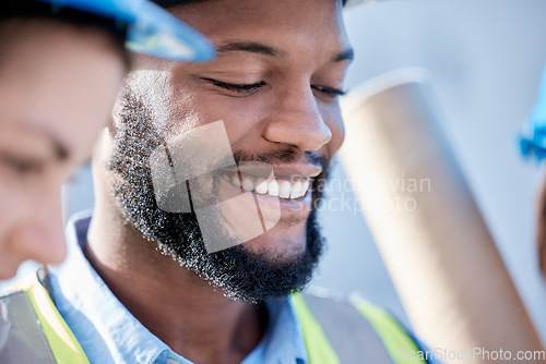 Image of Black man, architect and smile in construction for project planning, teamwork or leadership on site. Happy African American male contractor, engineer or builder smiling for industrial architecture