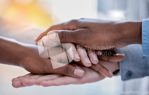 Image of Business people, diversity and hands together in trust, partnership or collaboration at office. Group of diverse employee workers piling hand in teamwork support, agreement or solidarity at workplace