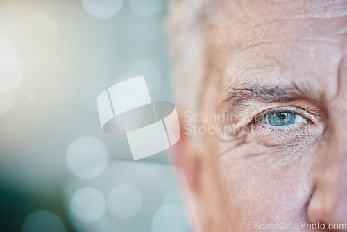 Image of Retina, vision and mockup with blue eye of old man for focus, optometry and healthcare. Iris, human and awareness with senior male and pupil for sight, natural and ophthalmology on bokeh background