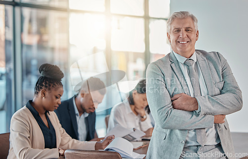 Image of Senior businessman, portrait and arms crossed for meeting leadership or management at the office. Happy elderly male CEO leader or manager smiling for teamwork collaboration or strategy at workplace