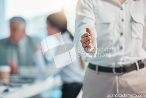 Image of Business person, handshake and greeting for b2b, partnership or meeting in agreement at the office. Employee showing hand for shaking hands in welcome, deal or team collaboration at the workplace