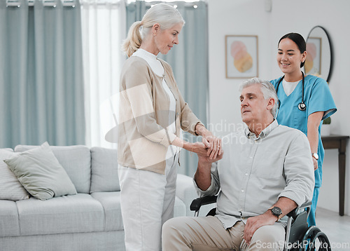 Image of Disability, doctor or old couple holding hands in rehabilitation for support, empathy or solidarity together. Physiotherapy healthcare, wheelchair or medical nurse nursing elderly disabled patient
