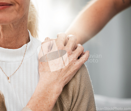 Image of Shoulder, old woman or nurse holding hands in hospital consulting about medical test news or results for support. Empathy, hope or doctor in healthcare clinic nursing or helping sick elderly patient