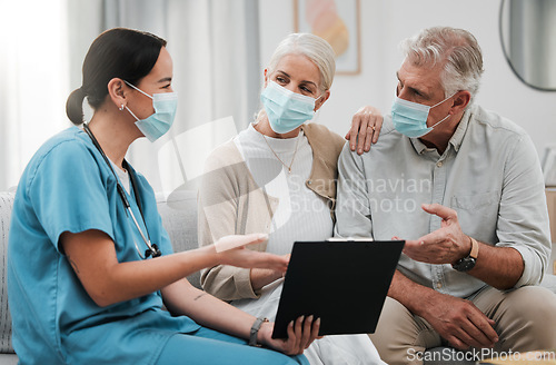 Image of Checklist, old couple or nurse in consultation for covid in hospital about medical test news or results. Face masks, coronavirus or doctor consulting in healthcare clinic nursing sick elderly people