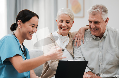Image of Nurse, healthcare and support with a senior couple in their home, talking to a medicine professional. Medical, insurance or life cover with a mature man and woman meeting a medicine professional