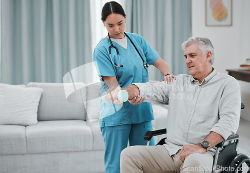 Image of Disability, nurse or old man with dumbbell in wheelchair moving arm for muscle strength in rehabilitation. Physiotherapy healthcare, nursing or medical doctor consulting disabled elderly patient